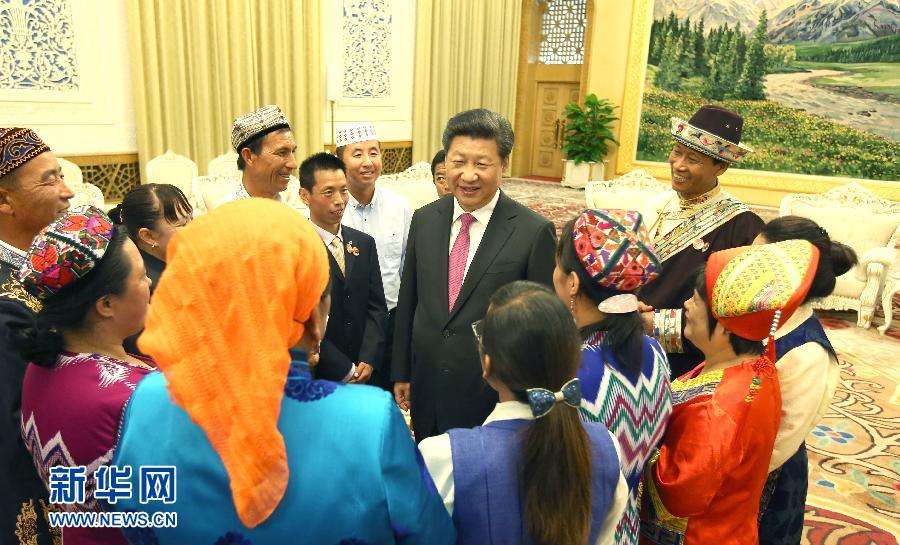 在中华人民共和国成立66周年之际,中共中央总书记、国家主席、中央军委主席习近平特别邀请来自内蒙古、广西、西藏、宁夏、新疆5个自治区的13名基层民族团结优秀代表到北京参加国庆活动。这是9月30日下午,习近平在人民大会堂亲切会见代表们。新华社记者 姚大伟 摄 在中华人民共和国成立66周年之际,中共中央总书记、国家主席、中央军委主席习近平特别邀请来自内蒙古、广西、西藏、宁夏、新疆5个自治区的13名基层民族团结优秀代表到北京参加国庆活动。这是9月30日下午,习近平在人民大会堂亲切会见代表们。新华社记者 姚大伟 摄