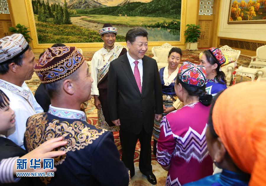 在中华人民共和国成立66周年之际,中共中央总书记、国家主席、中央军委主席习近平特别邀请来自内蒙古、广西、西藏、宁夏、新疆5个自治区的13名基层民族团结优秀代表到北京参加国庆活动。这是9月30日下午,习近平在人民大会堂亲切会见代表们。新华社记者 姚大伟 摄 在中华人民共和国成立66周年之际,中共中央总书记、国家主席、中央军委主席习近平特别邀请来自内蒙古、广西、西藏、宁夏、新疆5个自治区的13名基层民族团结优秀代表到北京参加国庆活动。这是9月30日下午,习近平在人民大会堂亲切会见代表们。新华社记者 姚大伟 摄