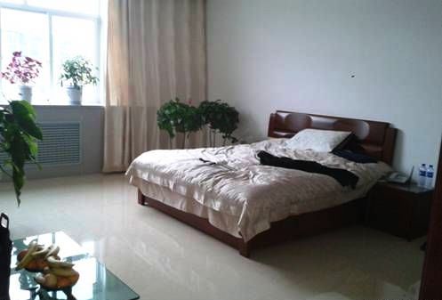 山西吕梁粮食局长办公室配双人床 当事人记过(图)